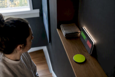 Partial sports scoreboard on a quiet home shelf